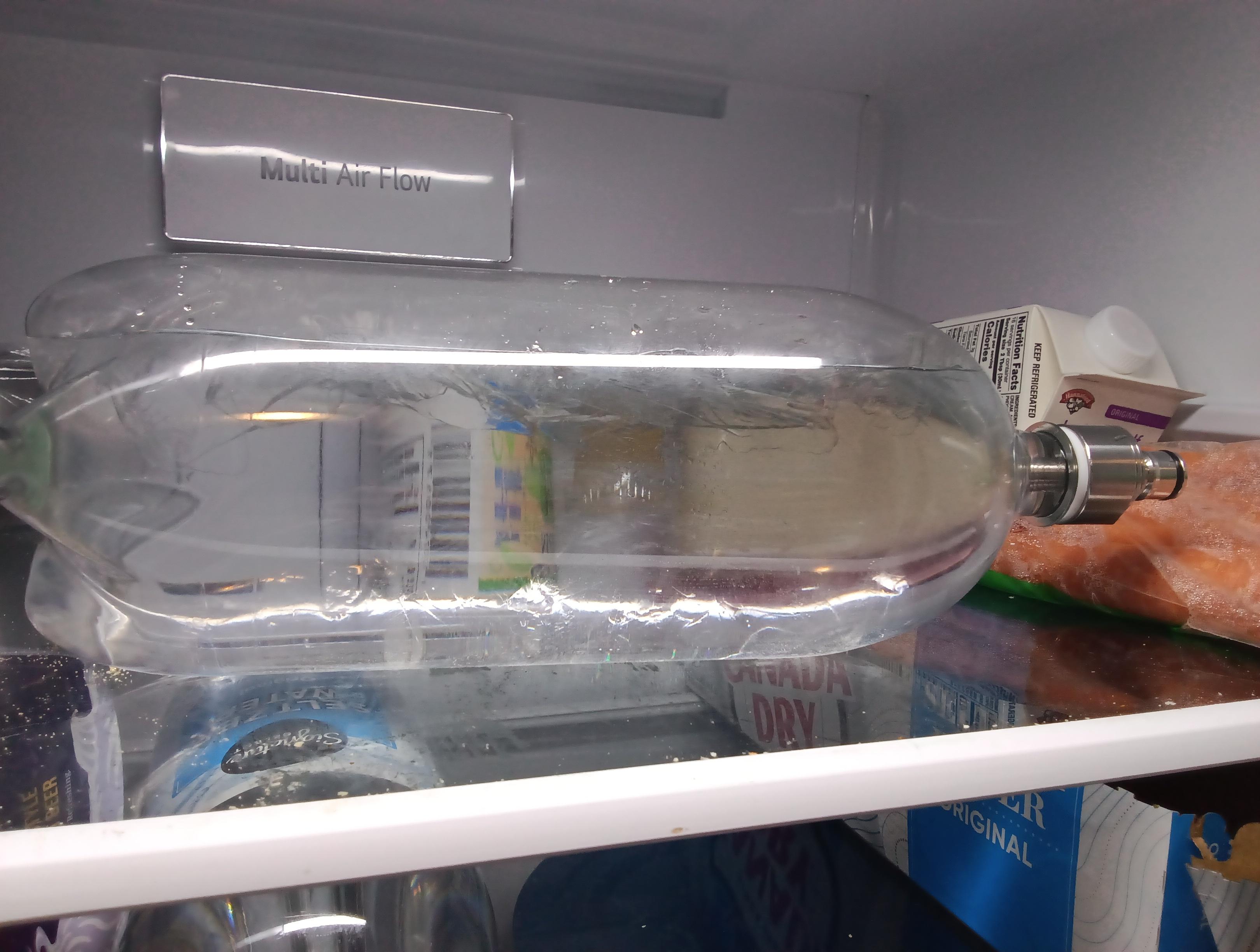 2 liter plastic bottle, full of icy water with a carbonating cap on it. It is sitting in the fridge at 50 psi of co2 to get fizzy